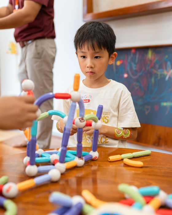 A child at work in the Giraffe Class at Orange Crest Preschool
